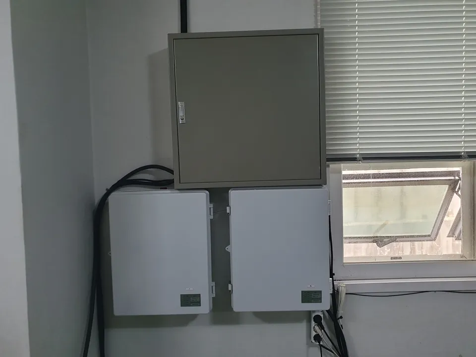 Existing switchboard in a plant electrical room before deployment